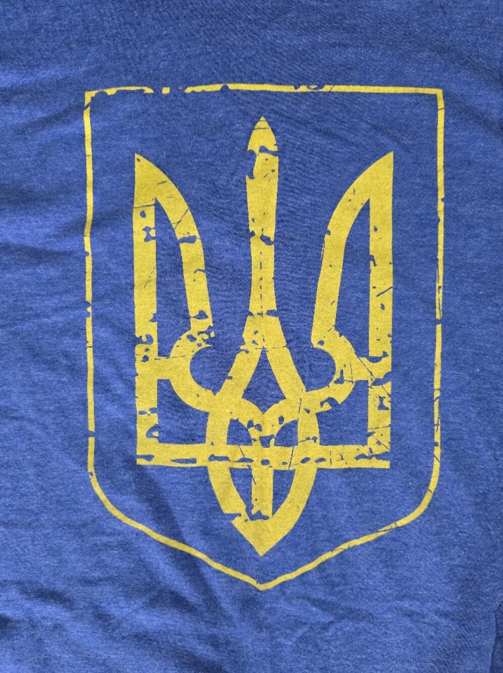 Blue Graphic Men's Tee with Yellow Crest